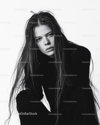 Expressive Black and White Portrait of Young Woman with Long Hair