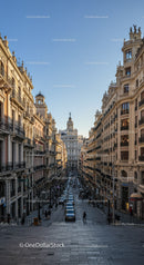 Elegant European City Street with Classic Architecture and Bustling Atmosphere