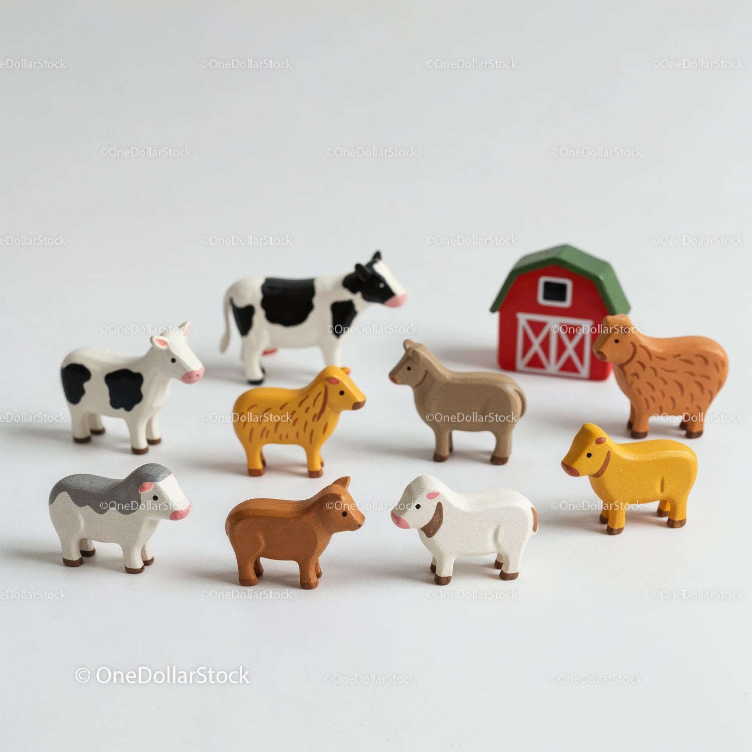 Colorful Wooden Farm Animal Figures with Red Barn and Green Roof