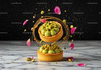 Pistachio tarts with caramel and rose petals on marble