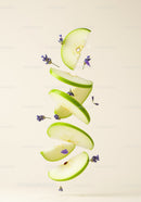 Floating slices of green apple with delicate lavender buds