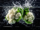 Fresh Cauliflower and Spinach Splash in Water for Healthy Diet