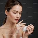Young Woman Applying Facial Cream for Healthy Skin