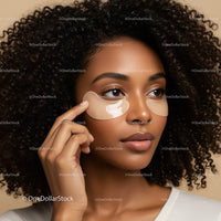 Close-up of a Woman with Curly Hair and Under Eye Patches
