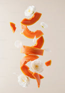 Floating Papaya Slices with Delicate White Flowers