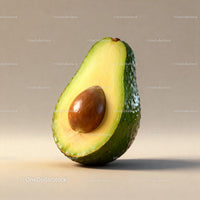 Fresh avocado half with seed on neutral background