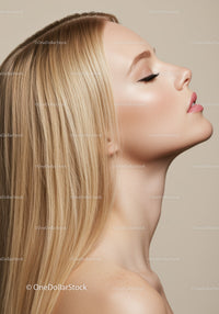 Profile of serene woman with flawless skin and long hair