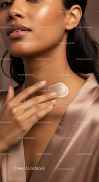 Close-Up of Woman Applying Moisturizer with Smooth Skin