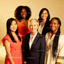 Confident diverse women smiling in warm studio light