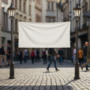 Blank white banner hanging between vintage street lamps
