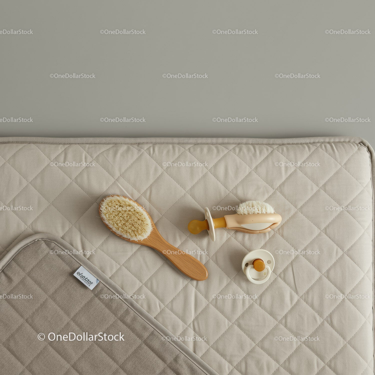 Minimalist Baby Care Essentials on Quilted Changing Mat