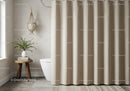 Neutral beige curtains and modern bathroom with lush indoor plant