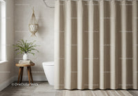 Neutral beige curtains and modern bathroom with lush indoor plant