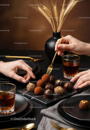 Elegant Assorted Chocolate Truffles and Gourmet Desserts on Black Marble