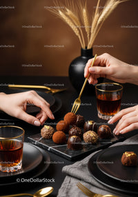 Elegant Assorted Chocolate Truffles and Gourmet Desserts on Black Marble