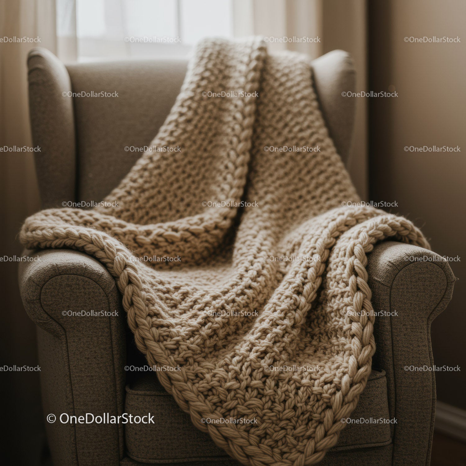 Cozy knitted blanket draped over armchair indoors