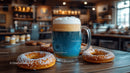 Blue Beer with Frothy Top and Sprinkled Donuts in Cozy Cafe