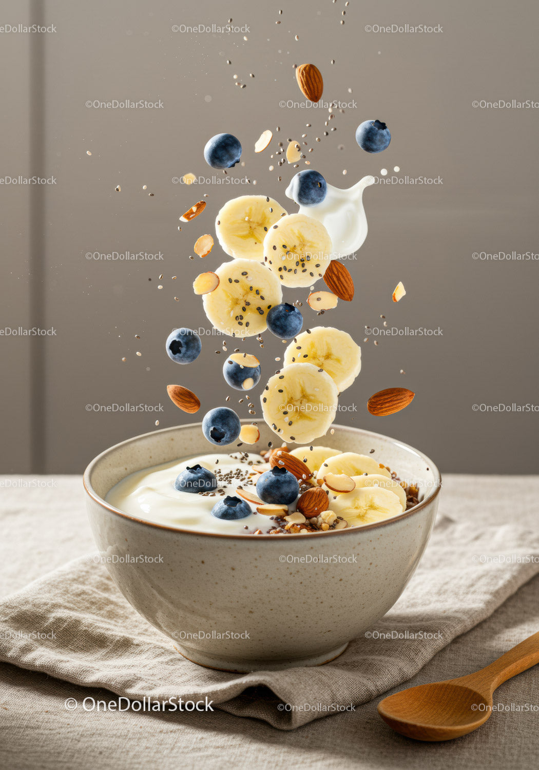 Healthy yogurt bowl with fresh fruits and nuts toppings
