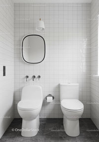 Minimalist White Bathroom with Wall Mirror and Modern Toilet
