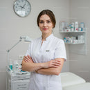 Professional Female Healthcare Worker in Modern Clinical Environment