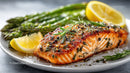 Grilled Salmon with Lemon and Asparagus on White Plate