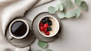Coffee and Berry Breakfast with Oats in Modern Ceramic Mug