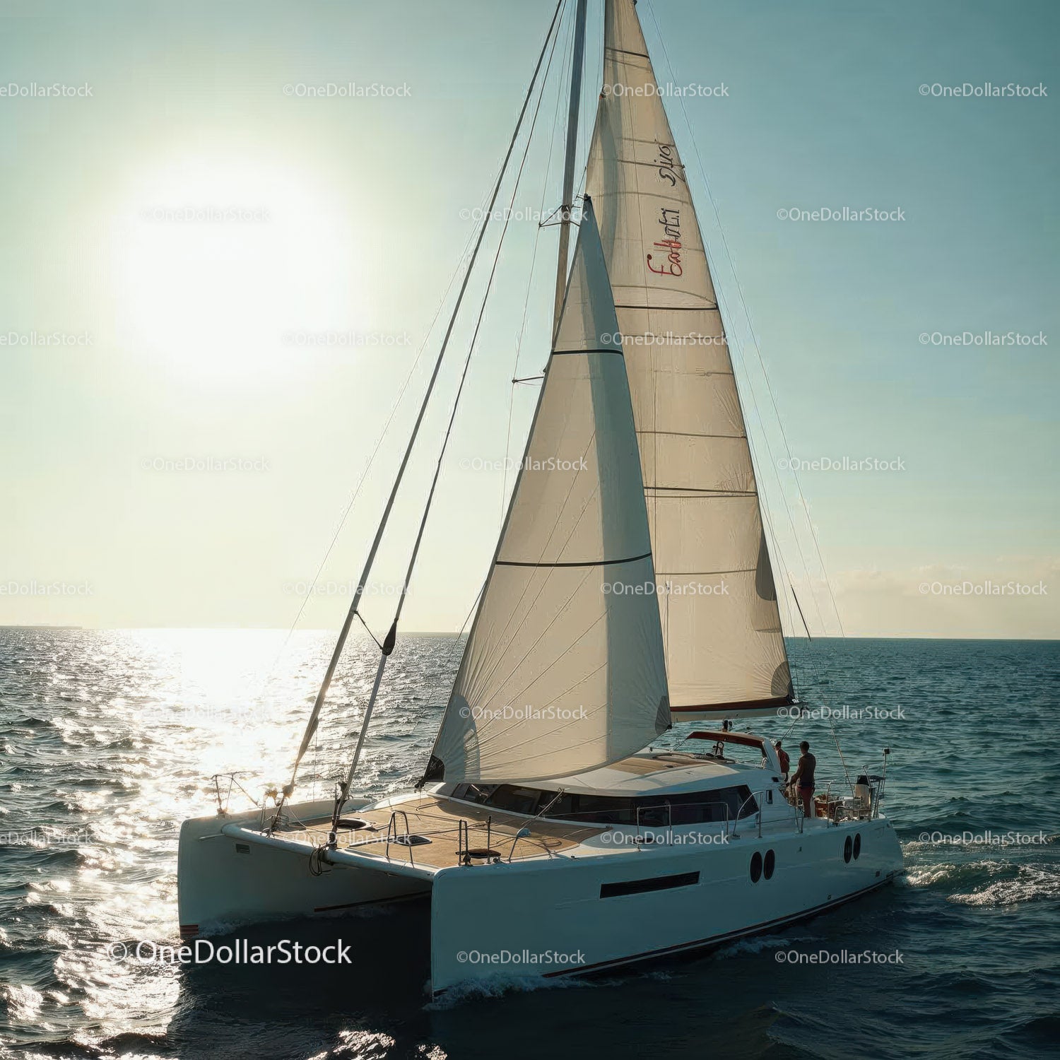 Luxury Sailing Yacht Gliding Across Calm Blue Sea at Sunset