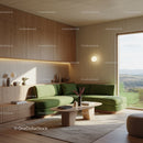 Modern living room with green sectional sofa and natural light