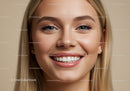 Close up portrait of smiling young woman with blonde hair