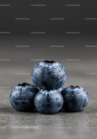 Close up of fresh blueberries with water droplets