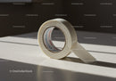 Transparent adhesive tape roll casting soft shadow