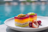 Colorful Fruit Jelly Dessert with Passion Fruit and Strawberries
