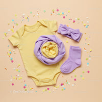 Yellow Baby Bodysuit with Purple Accessories and Confetti