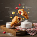 Fresh Croissants with Raspberry Jam and Butter on Tray