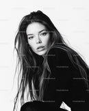 Elegant Black and White Portrait of a Young Woman with Long Hair
