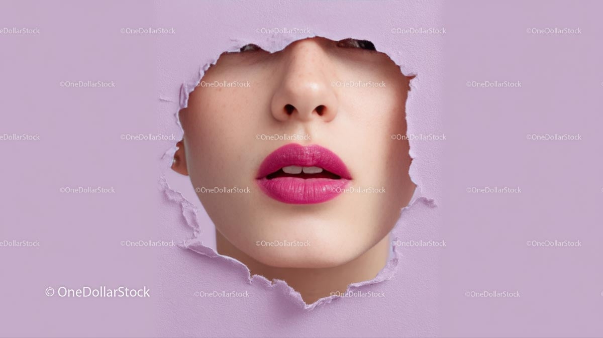 Captivating Female Portrait with Vibrant Pink Lipstick