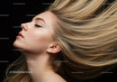 Profile of serene woman with flowing blonde hair