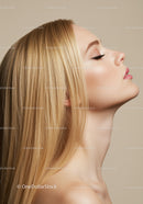 Profile of serene woman with long blonde hair