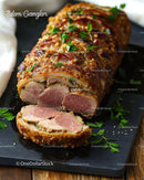 Gourmet Breaded Beef Roll with Crispy Crust and Herb Garnish