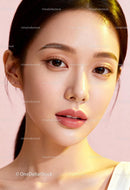 Close up of young woman with glowing skin and natural makeup
