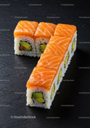 Fresh salmon sushi rolls arranged in number seven shape