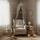 Cozy Reading Nook with Plush Armchair and Teddy Bear