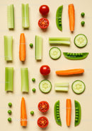 Colorful fresh vegetables arranged on beige background