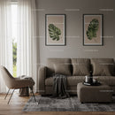 Elegant Living Room with Monstera Leaf Wall Art and Cozy Furniture
