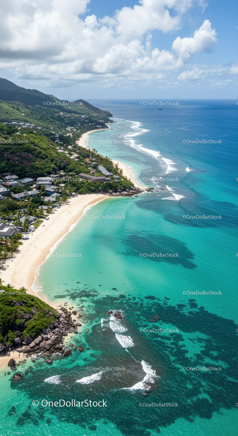 Scenic Tropical Beach with Blue Ocean and Green Hills