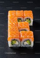 Fresh salmon sushi rolls with avocado and cream cheese