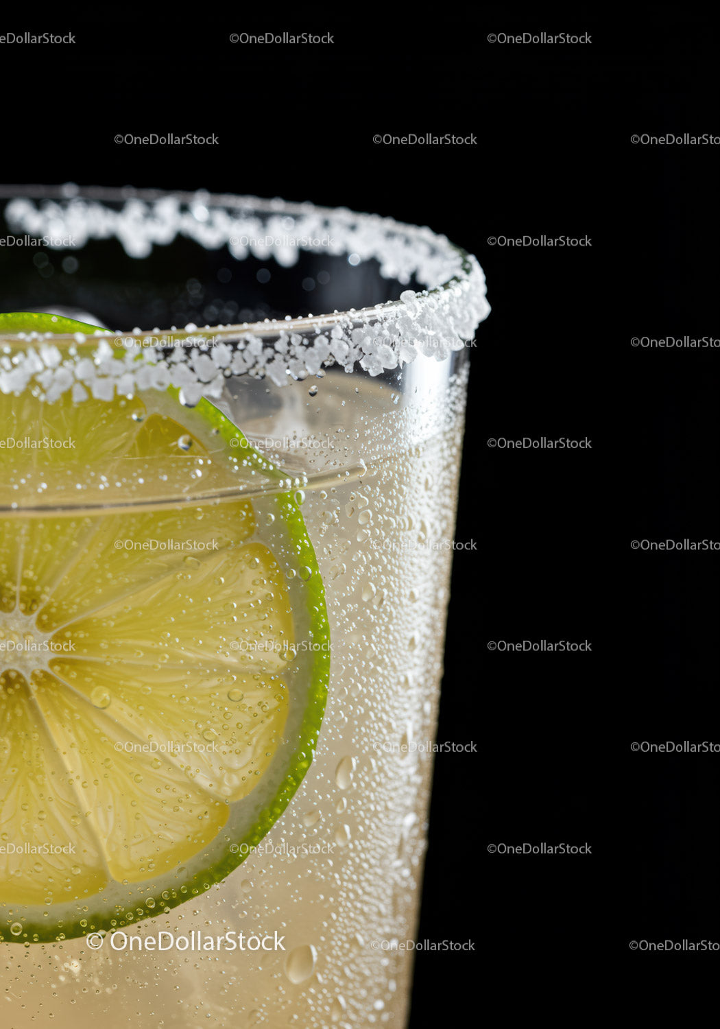 Refreshing Lime Beverage with Salt Rim in Glass