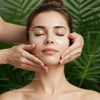 Serene Woman Receiving Face Massage in a Luxurious Spa Setting