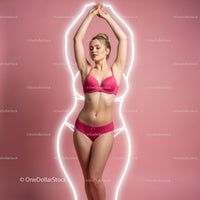 Elegant Woman in Pink Lingerie Performing Yoga Pose in Studio