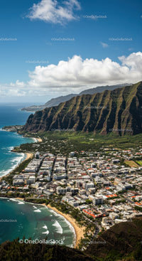 Scenic Coastal Town with Mountain Range and Urban Development